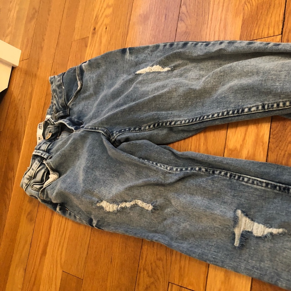 Acid wash tight ripped jeans